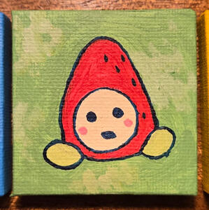 A small painting of the tamagotchi Ichigotchi on a green background.